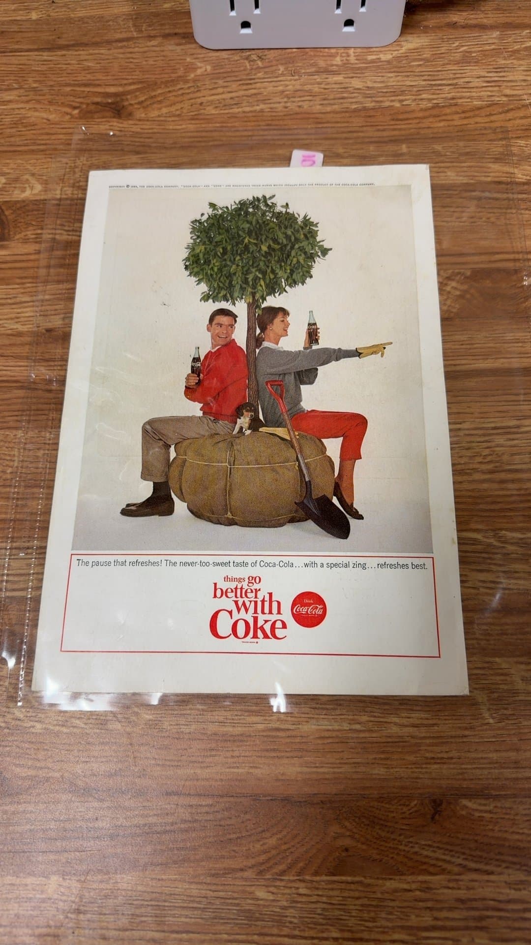 Vintage Coca-Cola and Ford Advertisements - Image 1
