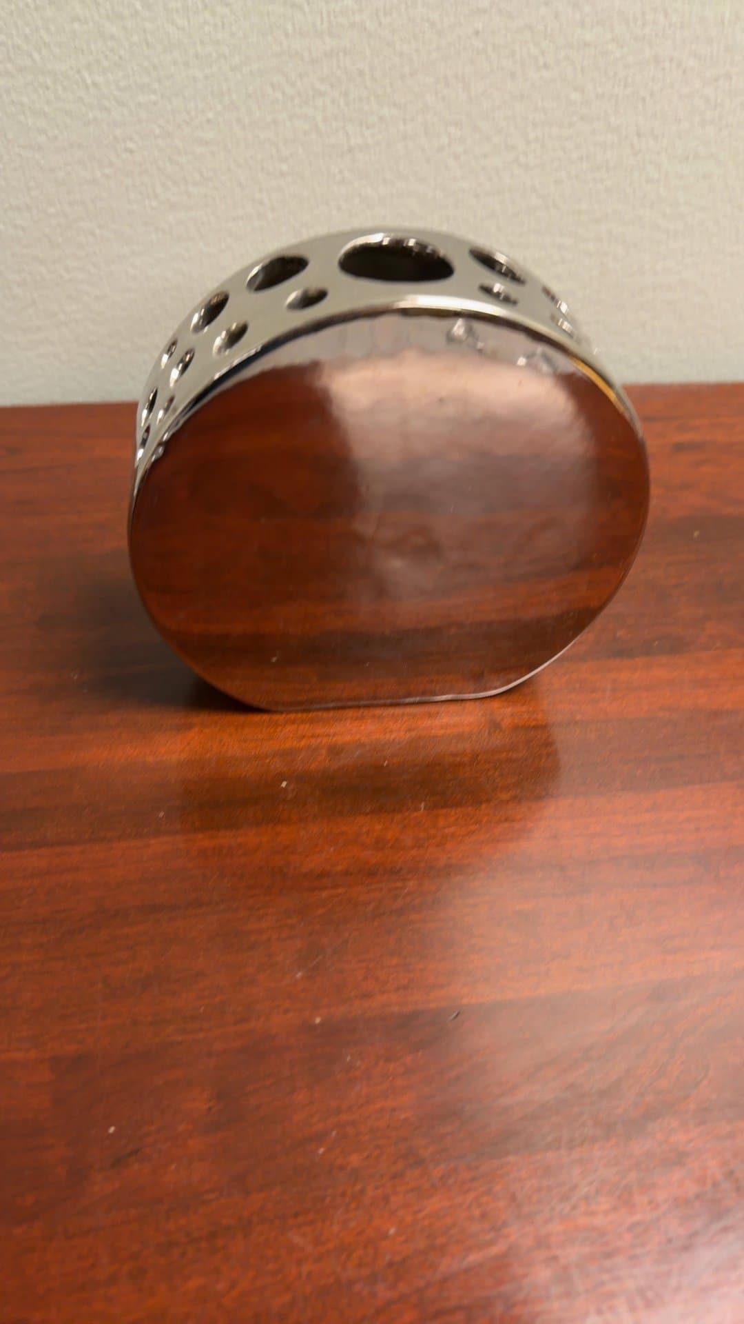 Modern Metal Vase with Circular Cutouts - Image 1