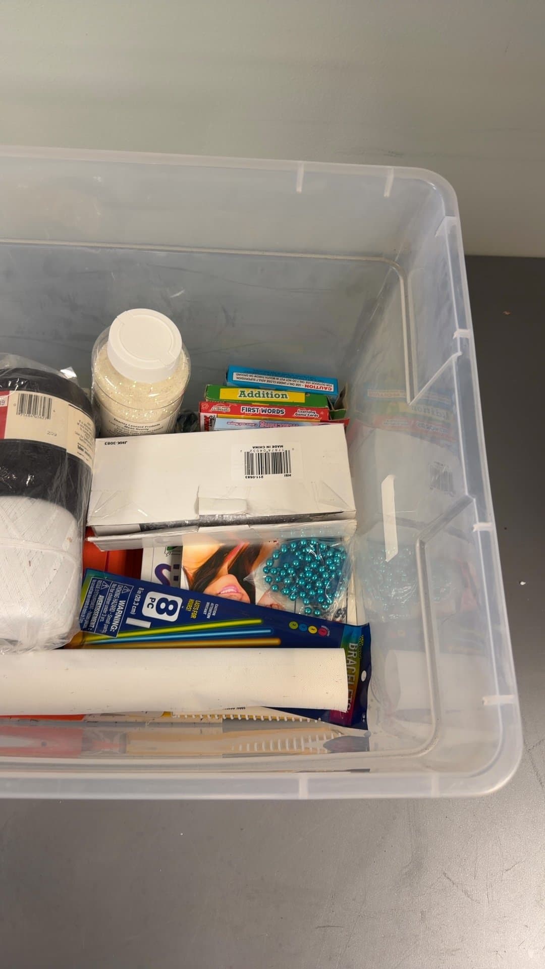 Assorted Craft Supplies Lot in Clear Storage Bin - Image 1