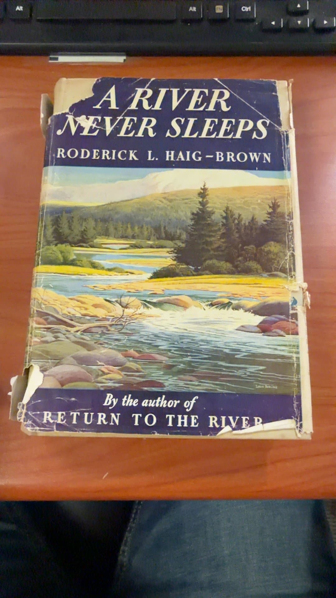 A River Never Sleeps by Roderick L. Haig-Brown - Image 1