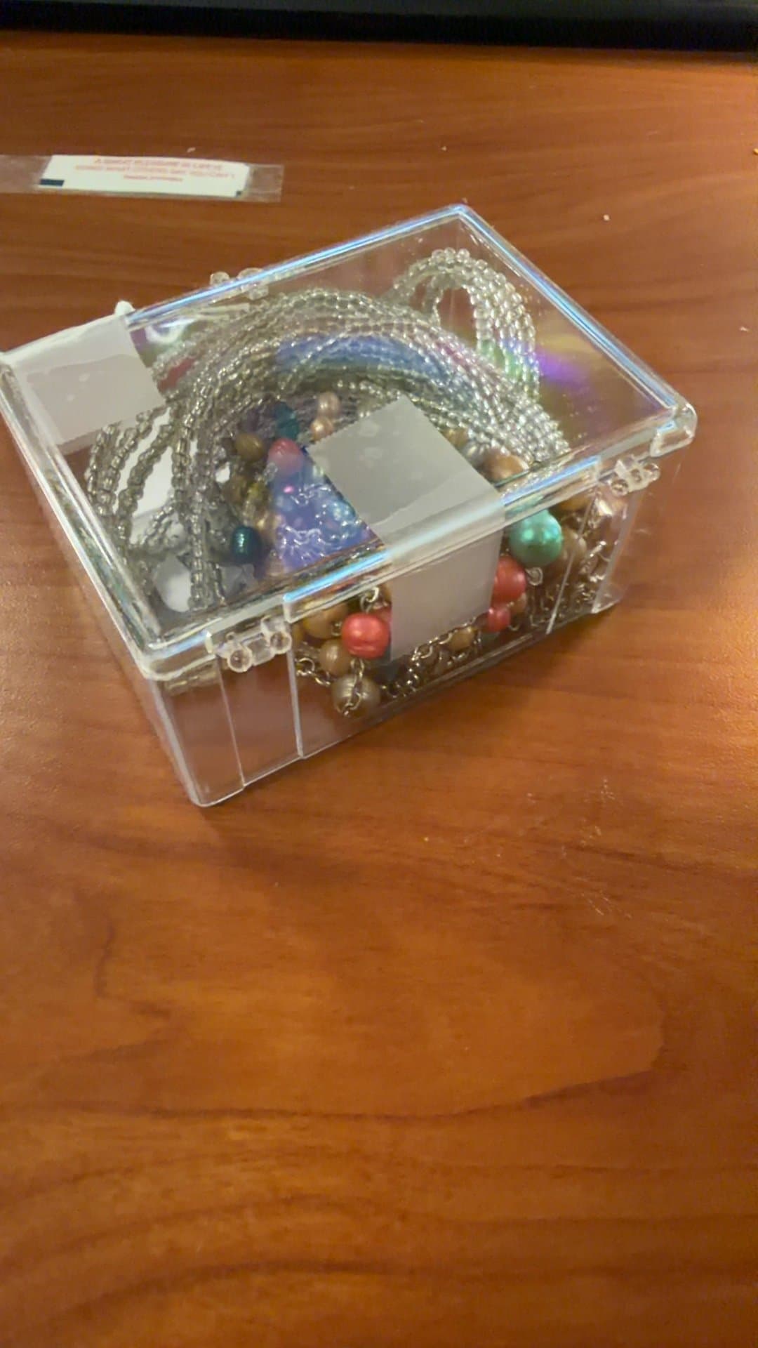Assorted Beaded Jewelry in Clear Plastic Box - Image 1