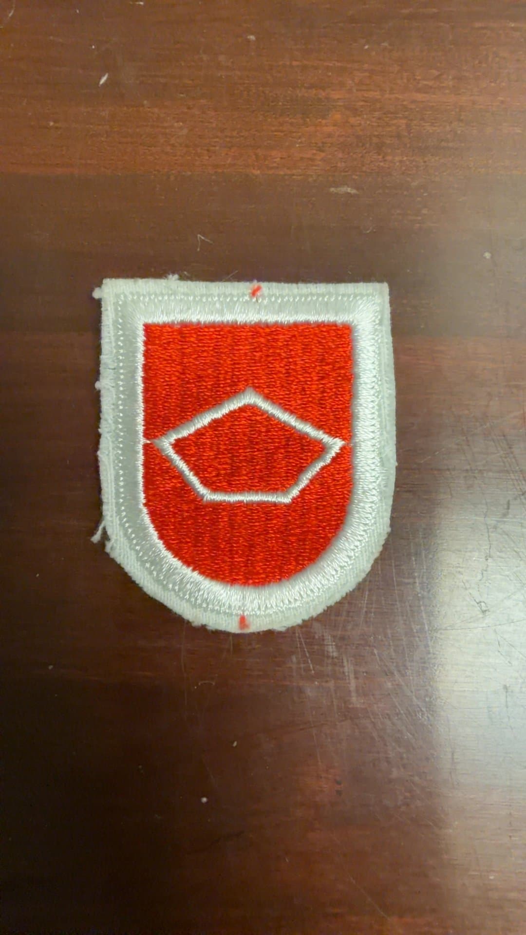 Red Embroidered Shield Patch - Image 1