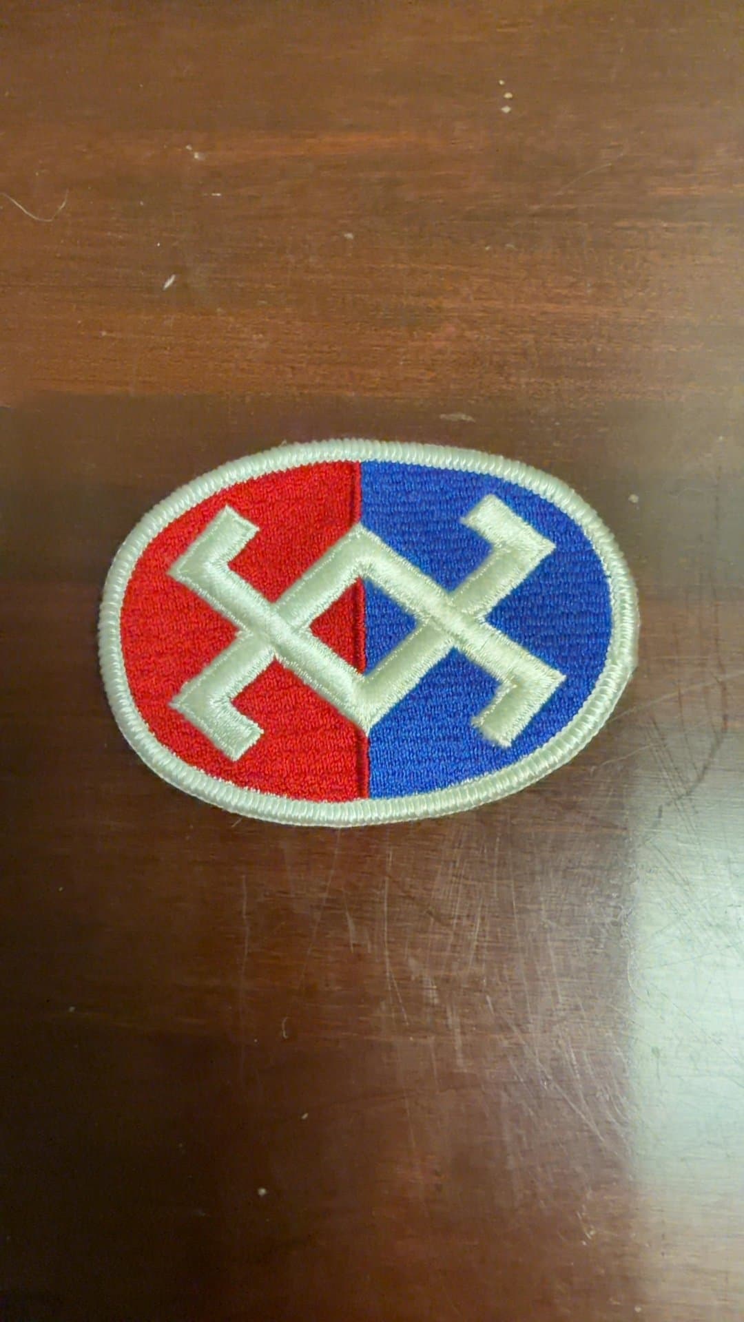 Vintage Military Patch with Red and Blue Emblem - Image 1