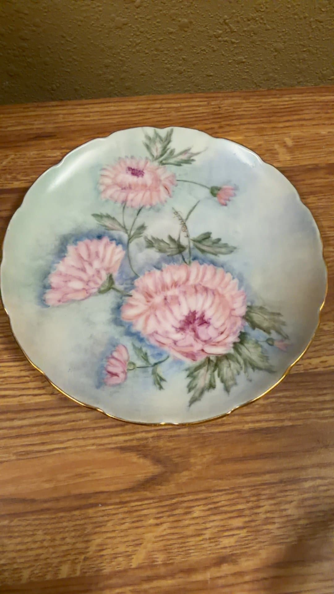 Hand-Painted Porcelain Plate with Floral Design - Image 1