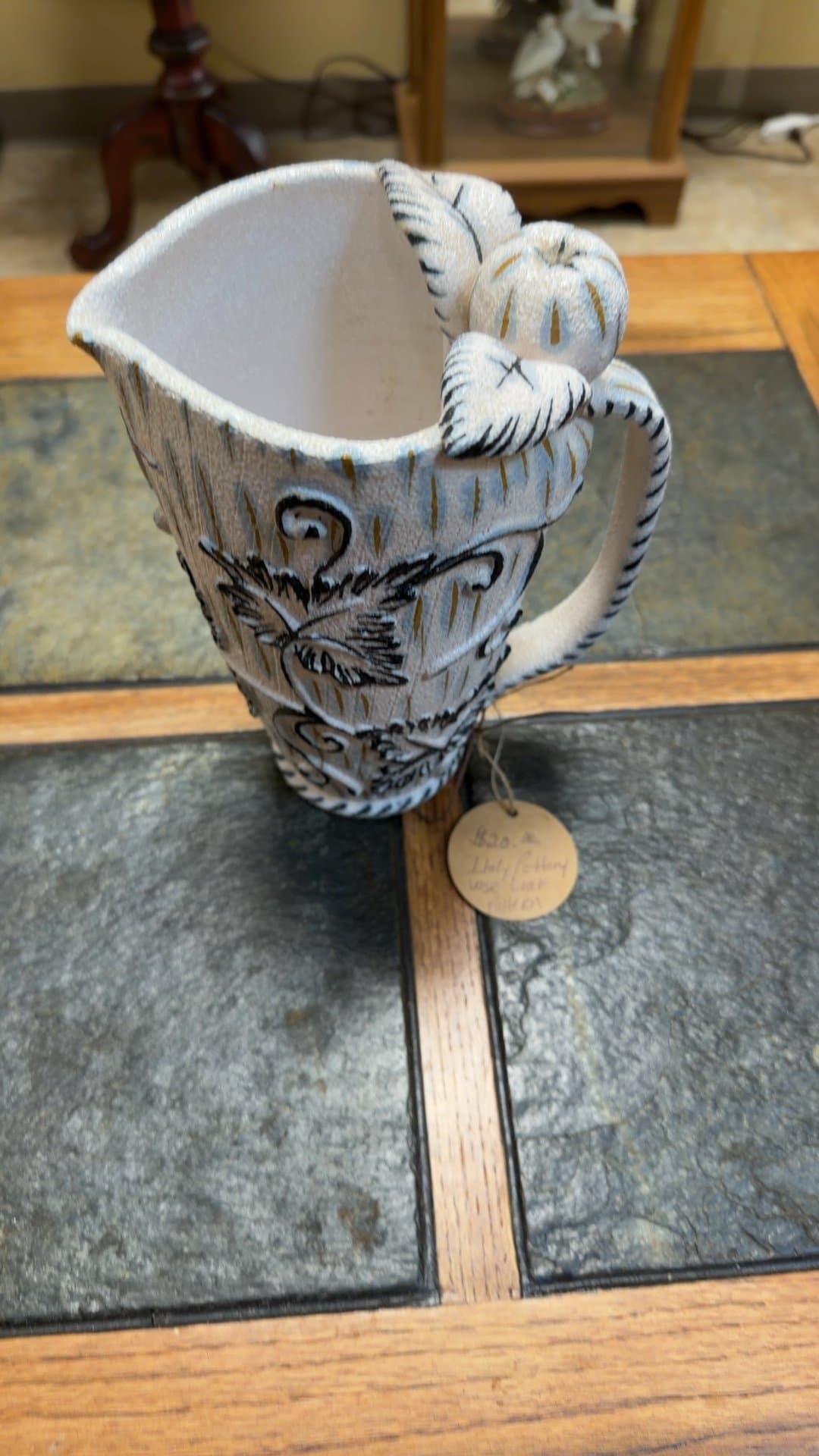 Handcrafted Ceramic Pitcher with Floral Design - Image 1