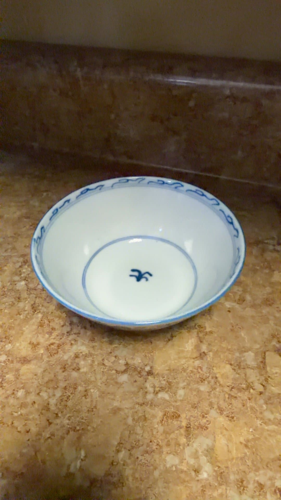 Blue and White Ceramic Bowl - Image 1