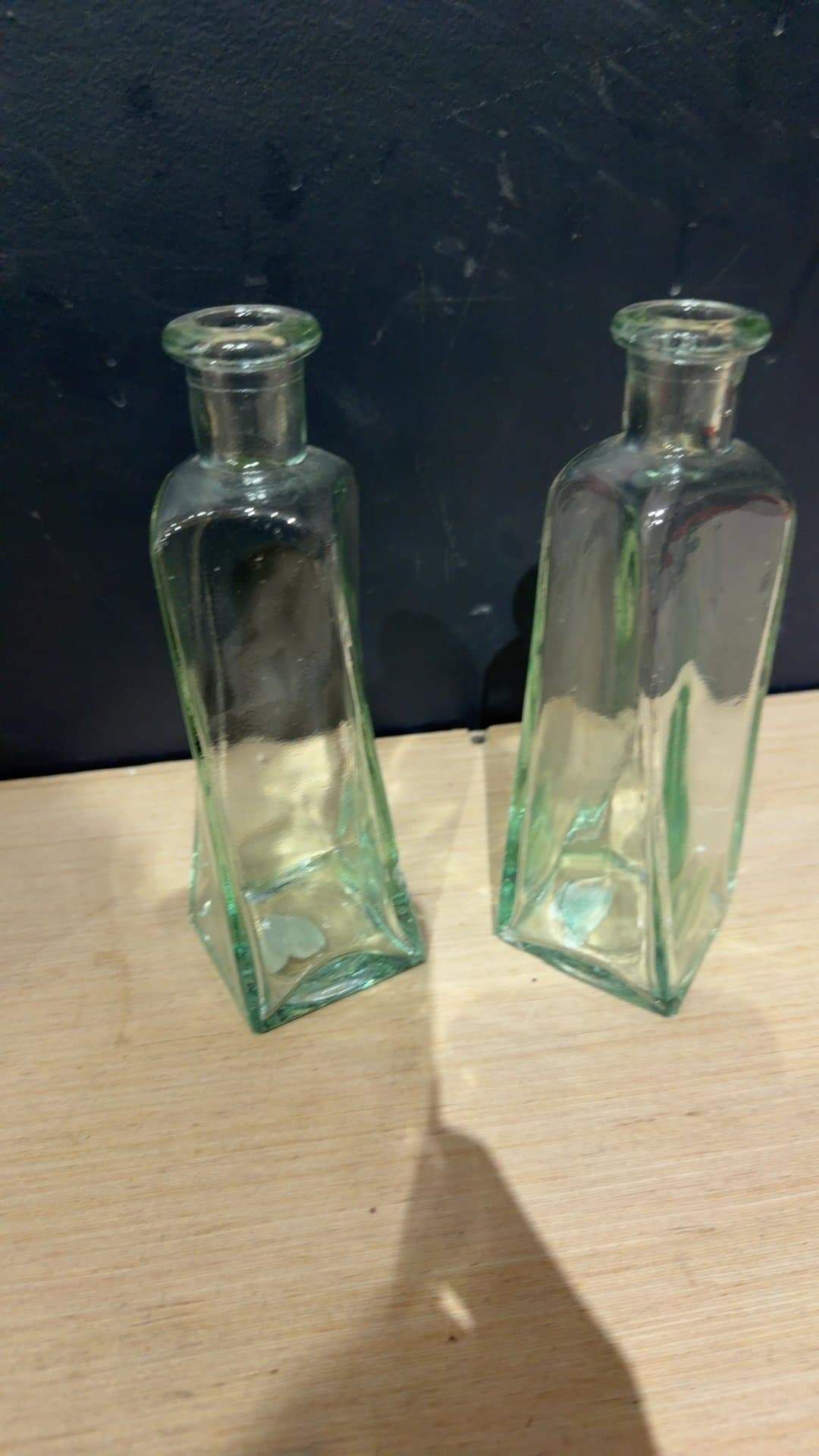 Twisted Green Glass Decorative Bottles - Image 1