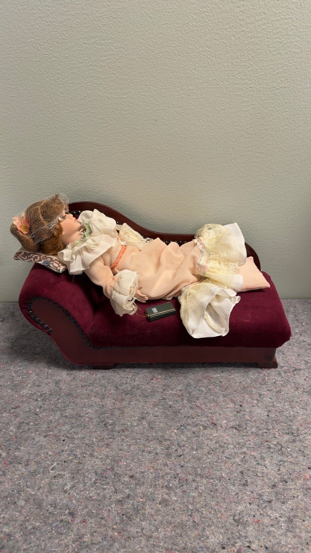Victorian Style Porcelain Doll on Chaise Lounge - Image 1