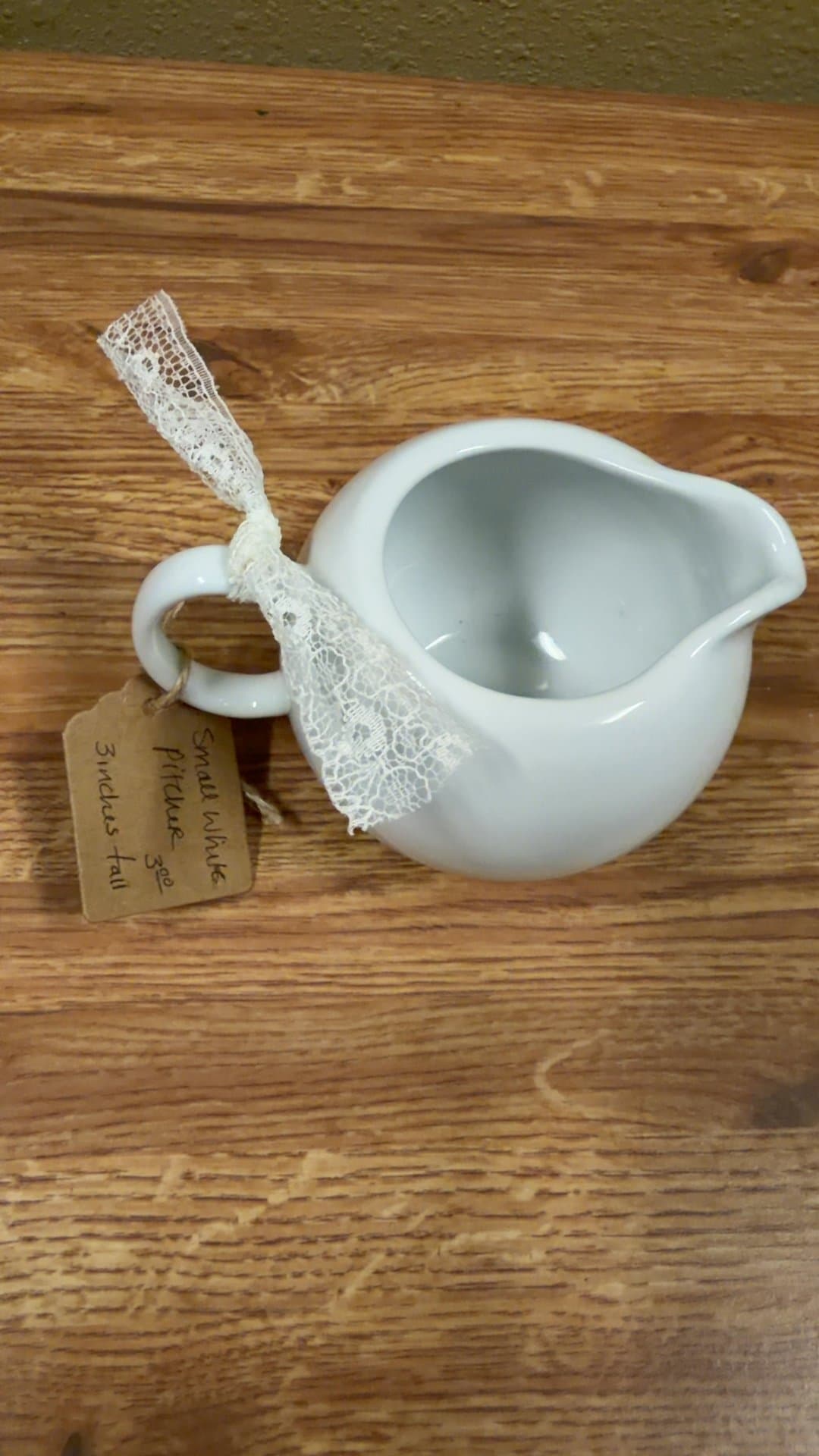 Small White Ceramic Pitcher - Image 1