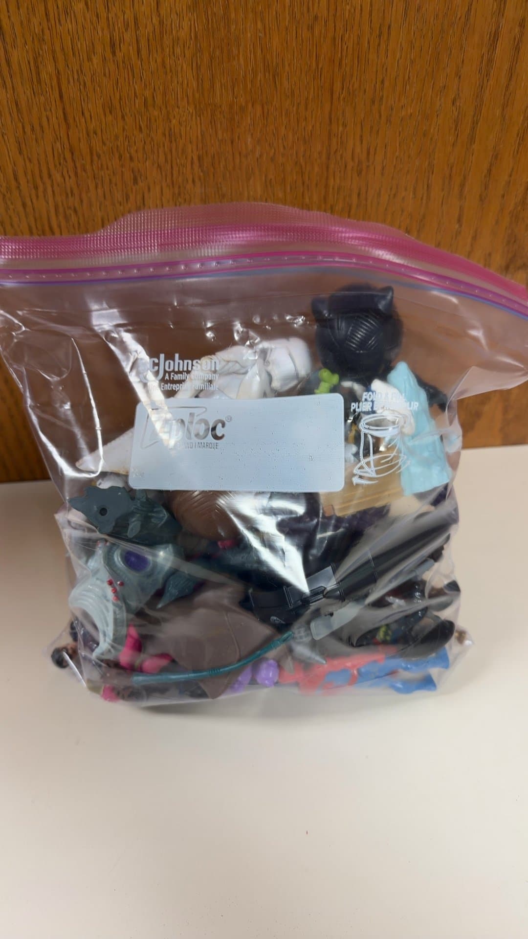 Assorted Mini Action Figures and Toy Accessories Lot - Image 1