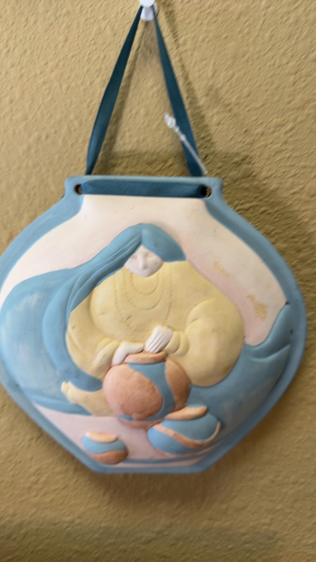 Decorative Ceramic Wall Hanging with Woman and Pot Design - Image 1