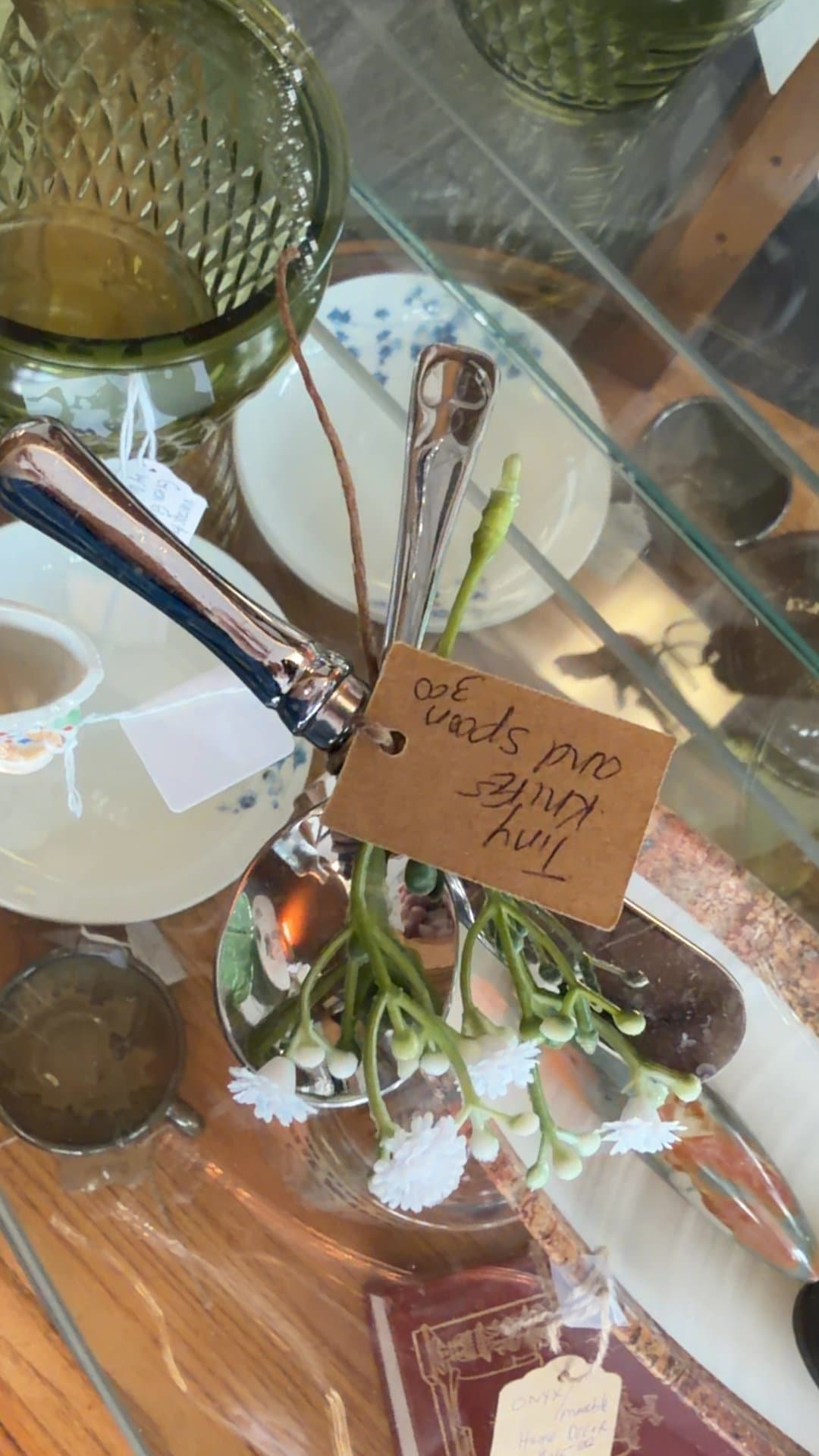 Vintage Silverware Set with Floral Arrangement - Image 1