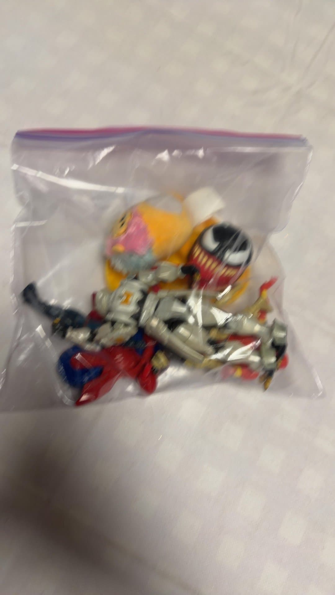 Assorted Mini Action Figures and Fidget Toy Lot - Image 1