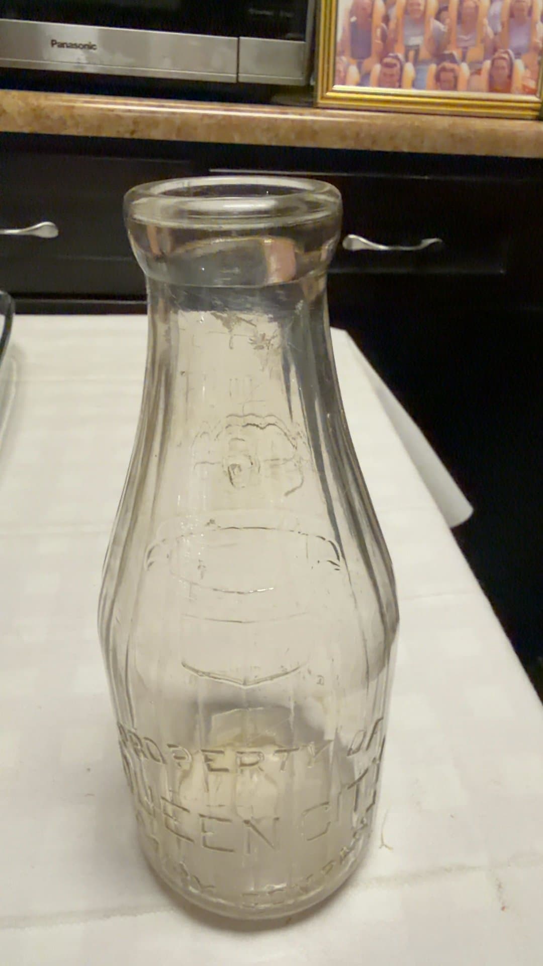 Queen City Dairy Embossed Glass Milk Bottle - Image 1