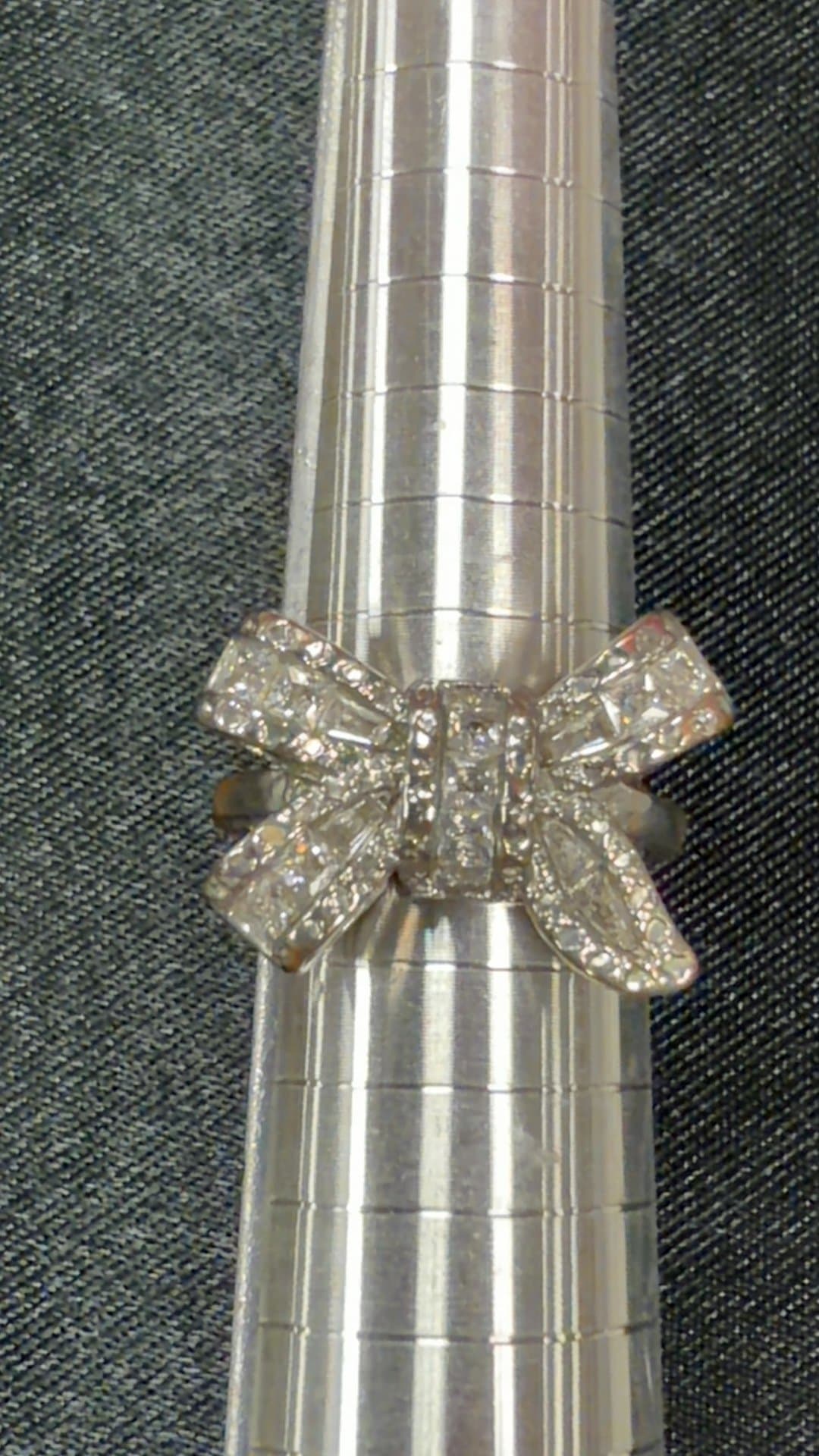 Silver Bow Ring with Clear Stones - Image 1