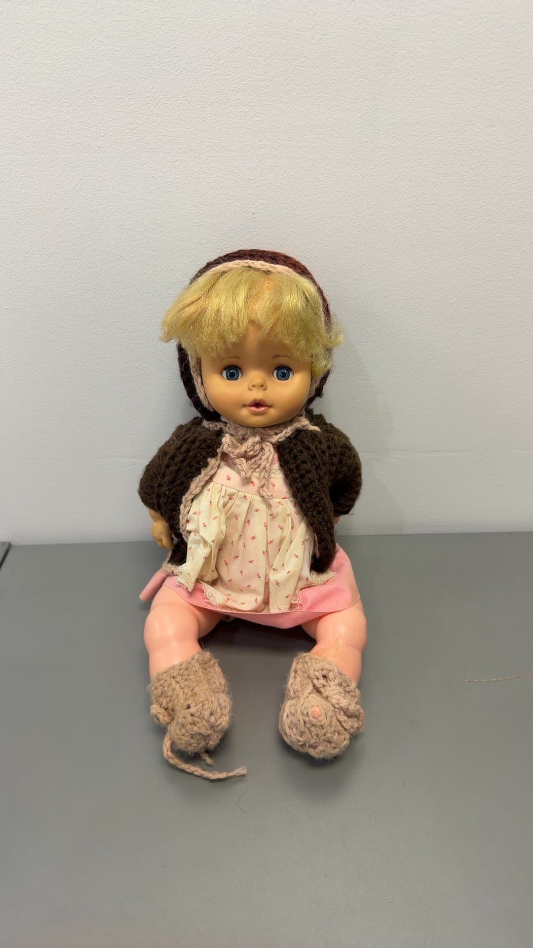 Vintage Vinyl Baby Doll with Knitted Bonnet and Jacket - Image 1