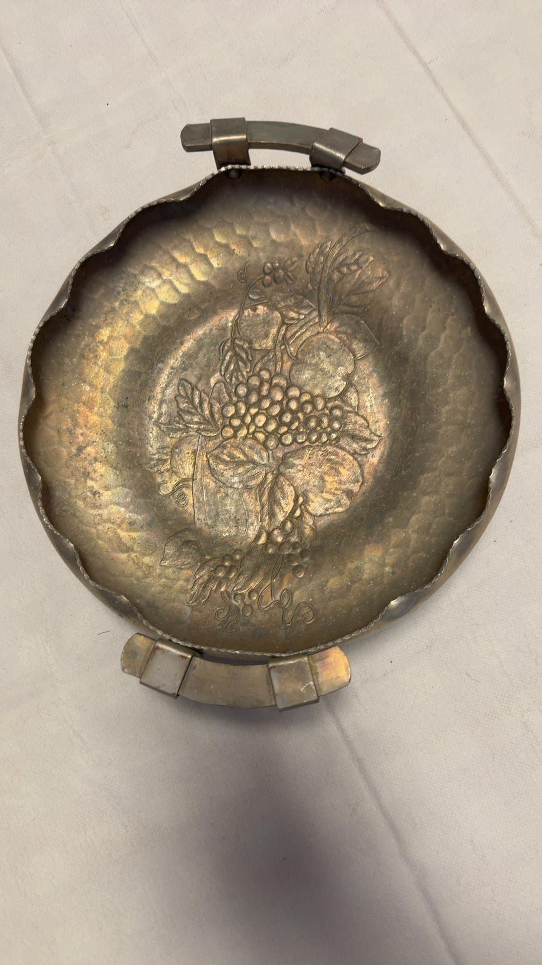 Vintage Hand-Forged Metal Dish with Floral Design - Image 1