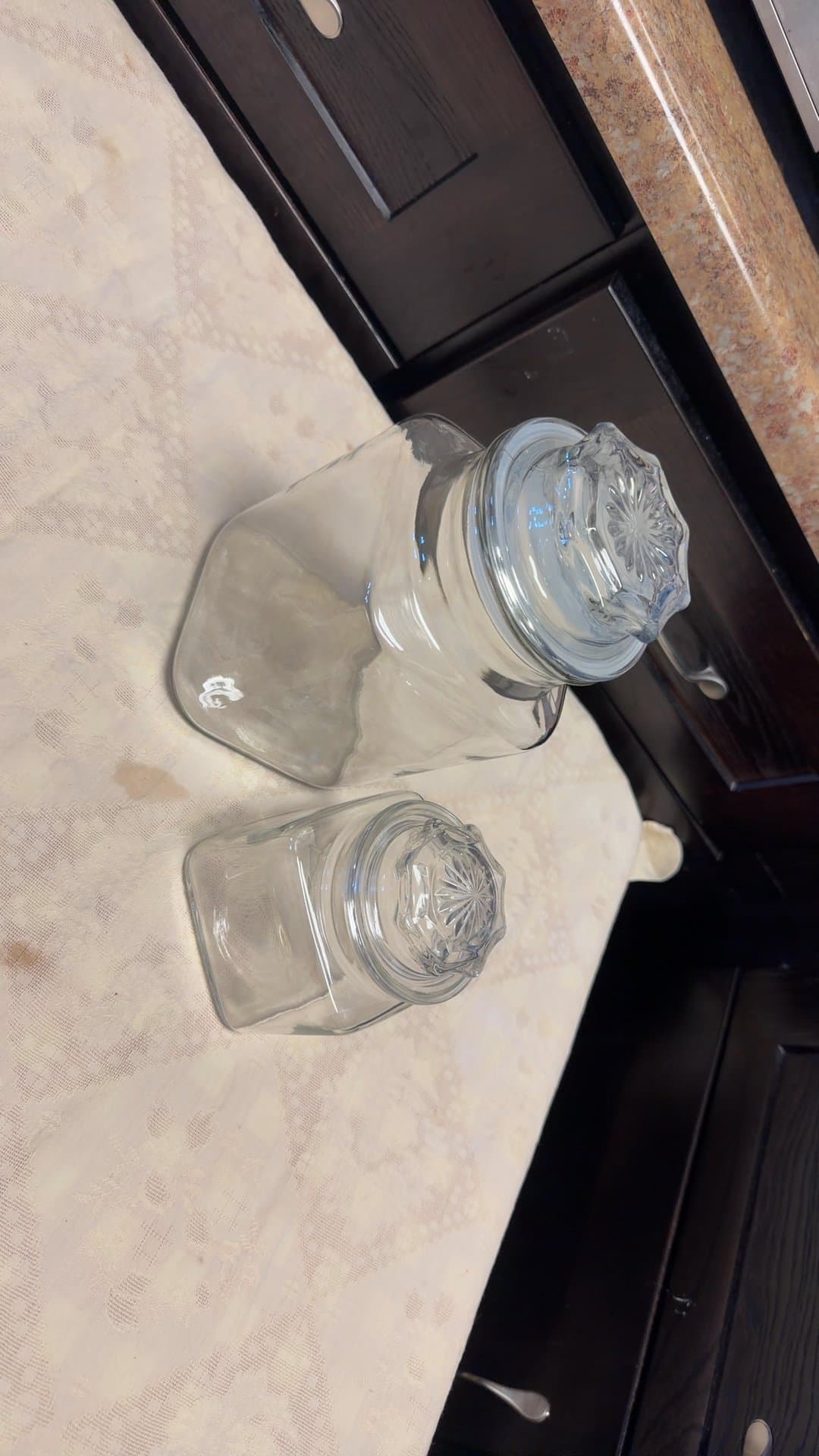 Set of Two Glass Storage Jars with Starburst Lids - Image 1