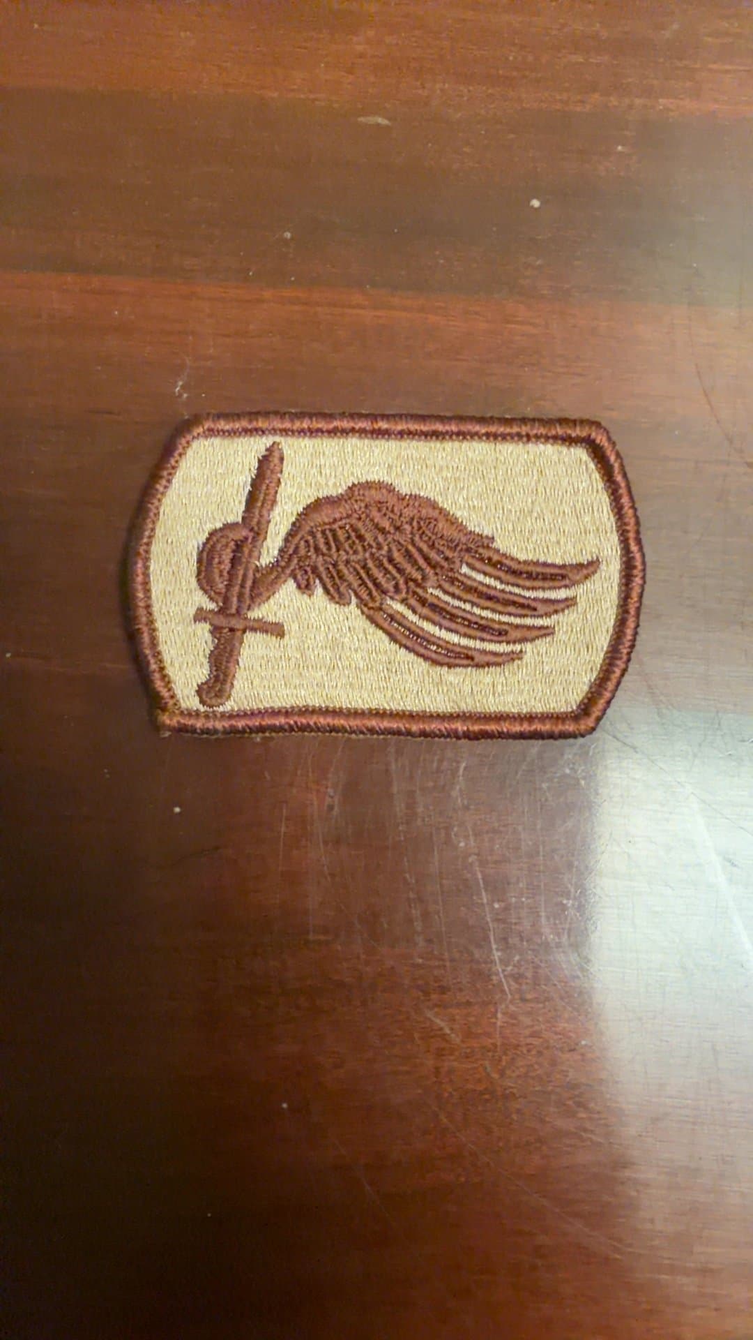 Military Style Embroidered Patch with Sword and Wing Design - Image 1