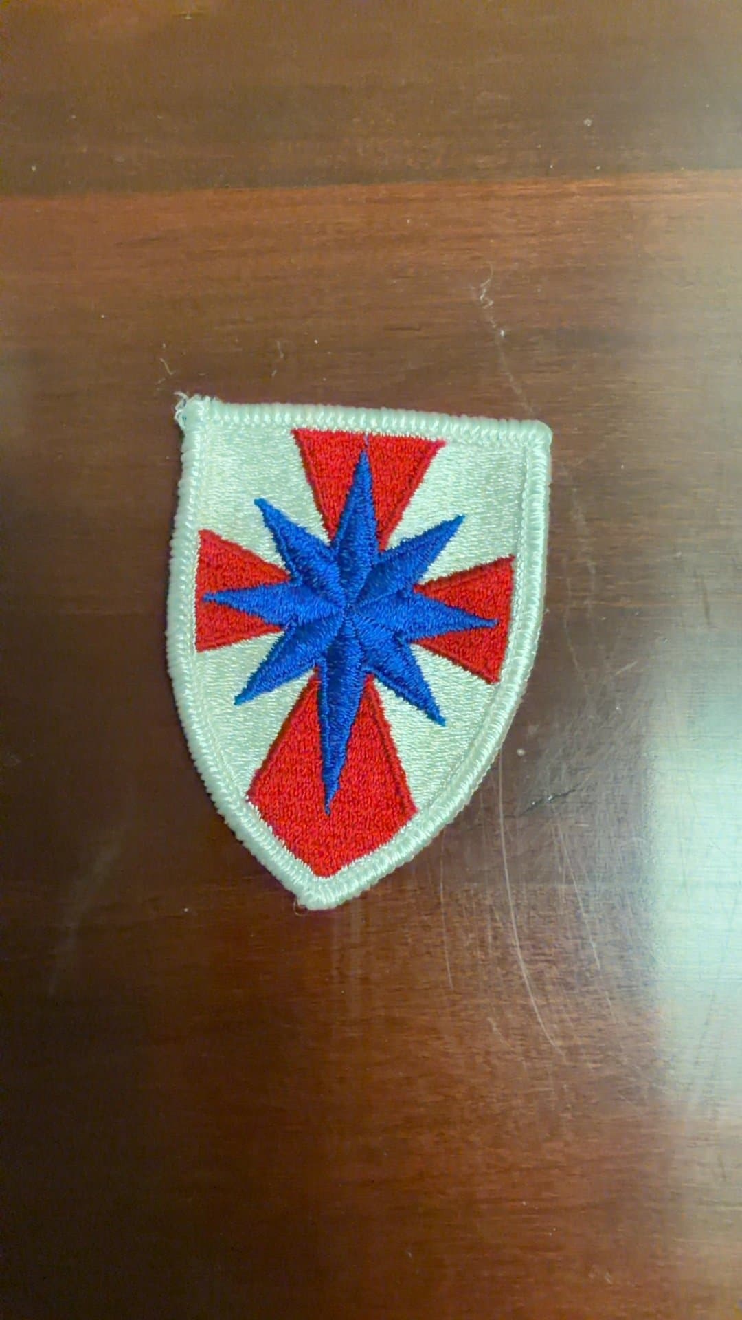 Embroidered Shield Patch with Star Design - Image 1