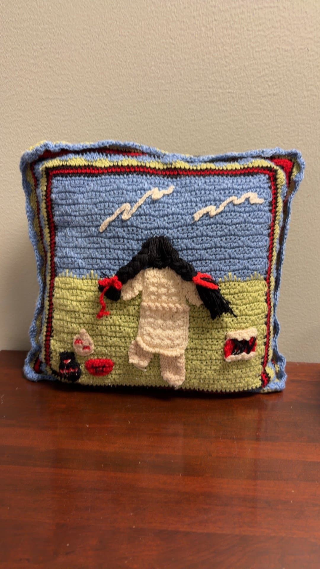 Handmade Knitted Cushion with Girl Design - Image 1