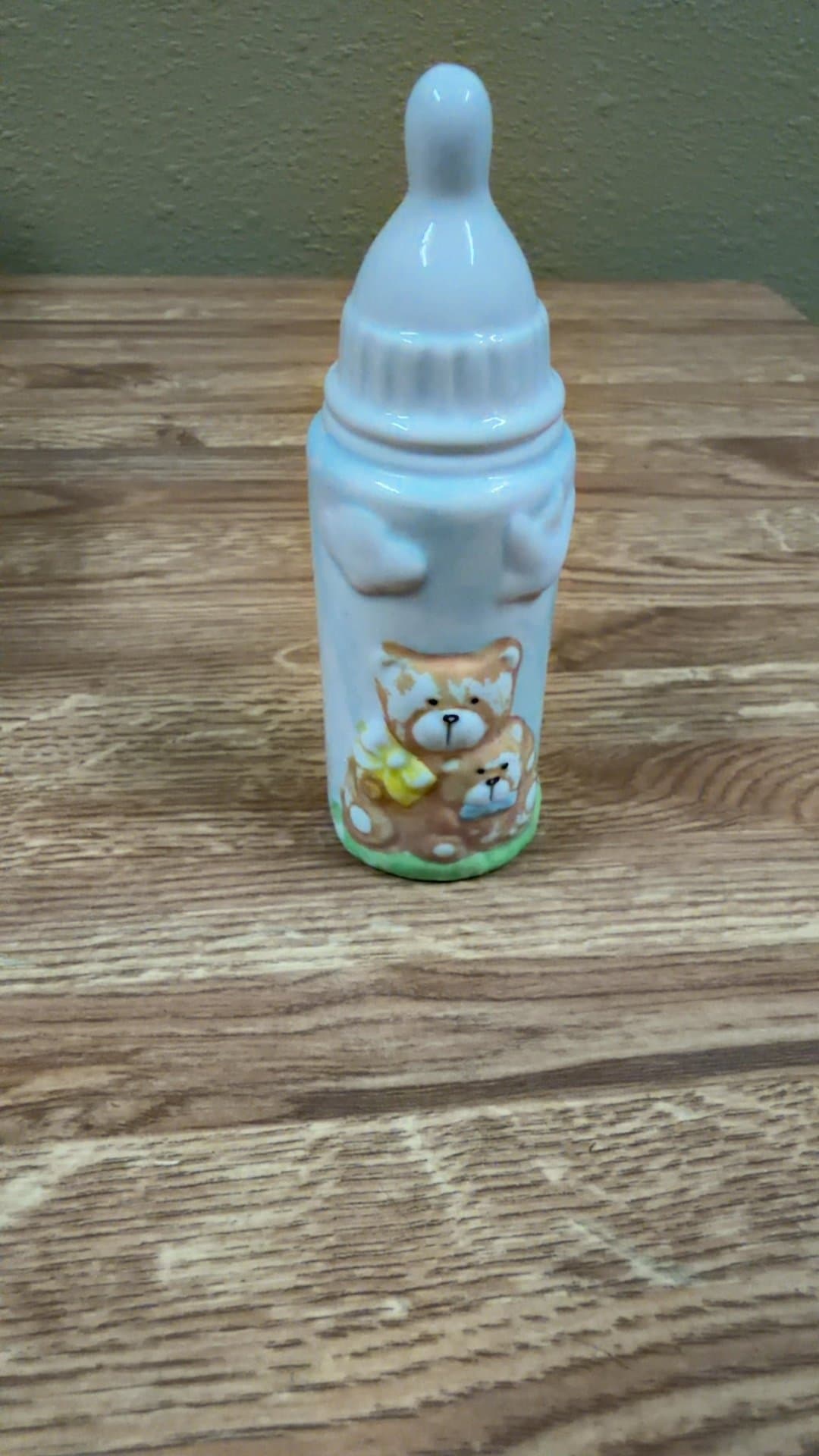 Ceramic Baby Bottle Figurine with Teddy Bear Design - Image 1