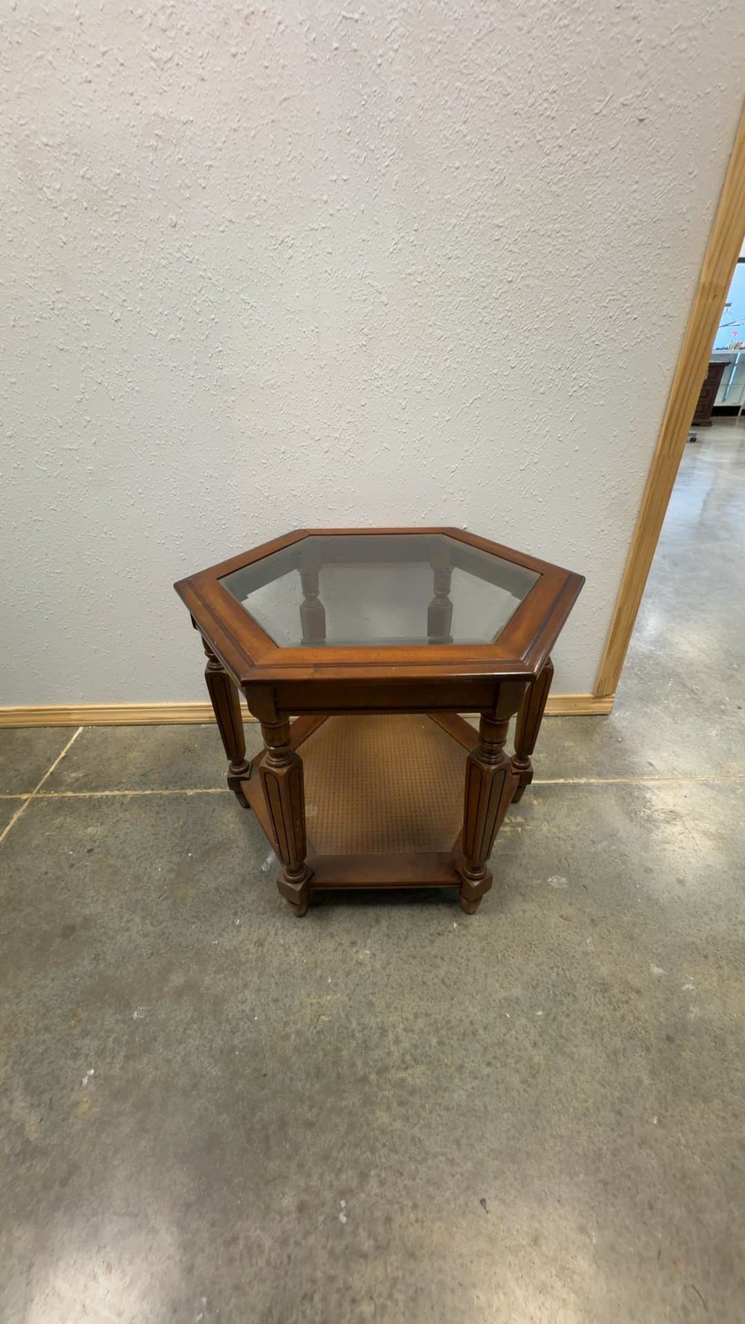 Hexagonal Glass Top Wood End Table with Cane Bottom Shelf - Image 1