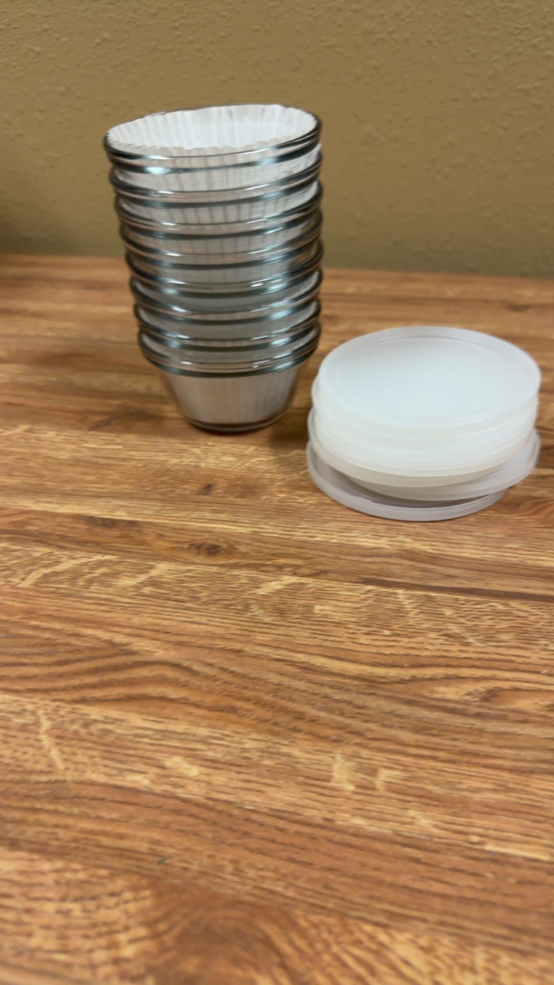 Stack of Metal Ramekins with Lids - Image 1