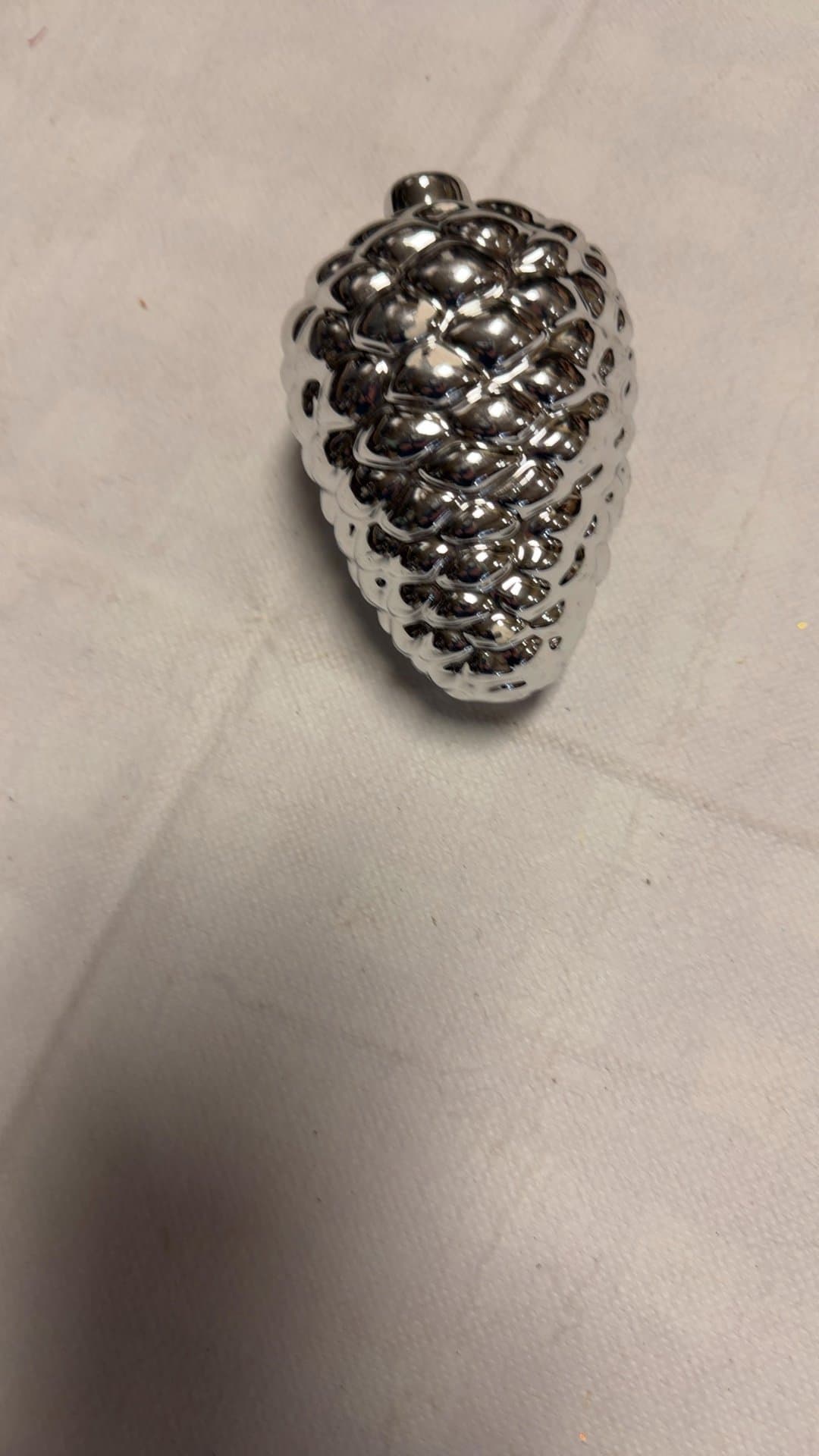 Silver Ceramic Pinecone Decor - Image 1