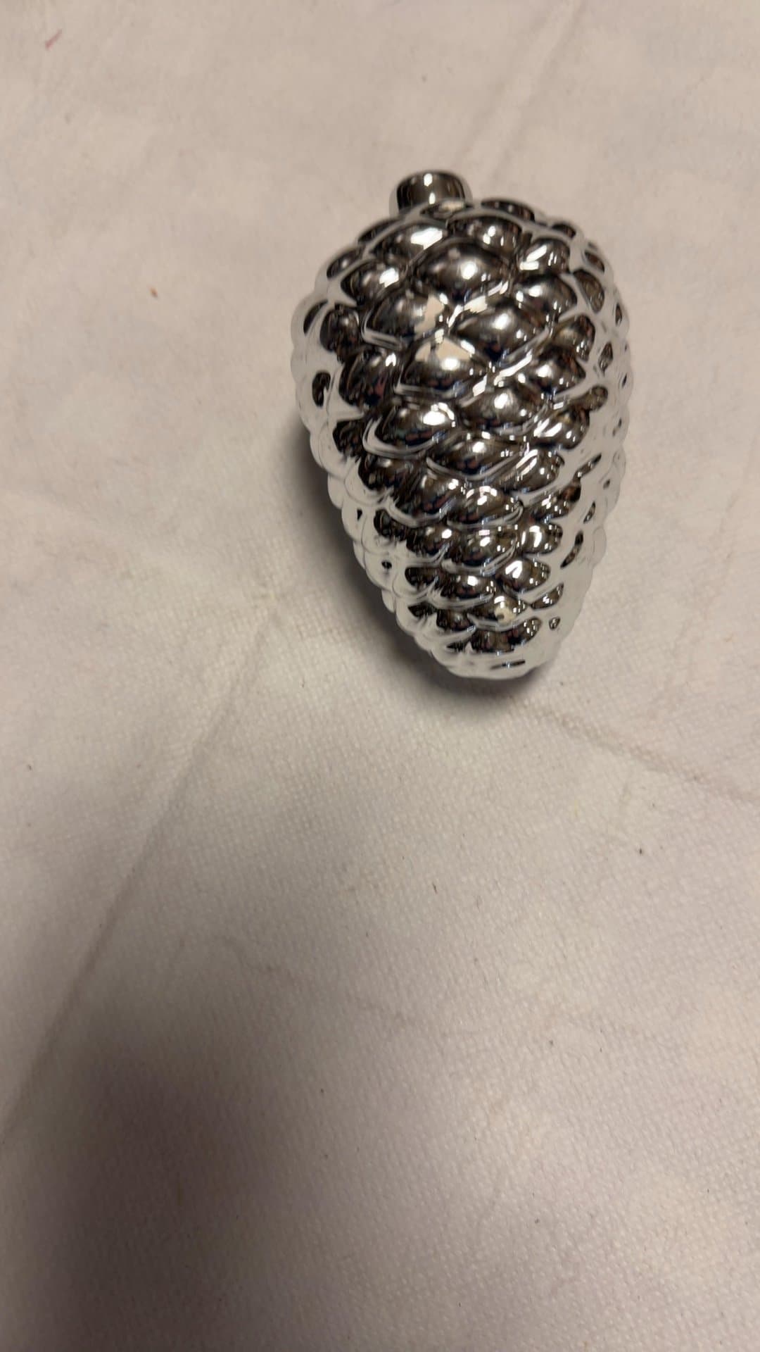 Silver Ceramic Pinecone Decor - Image 1