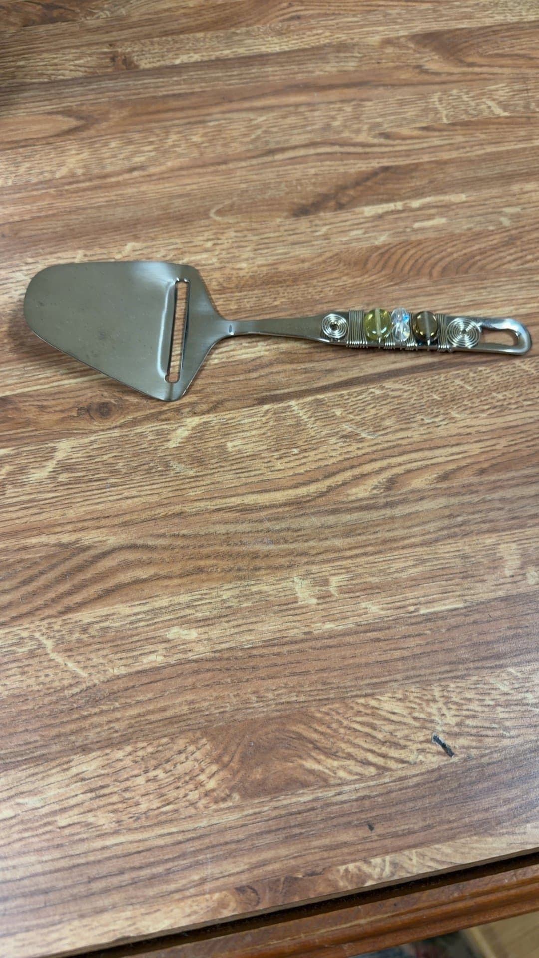 Decorative Cheese Slicer with Beaded Handle - Image 1