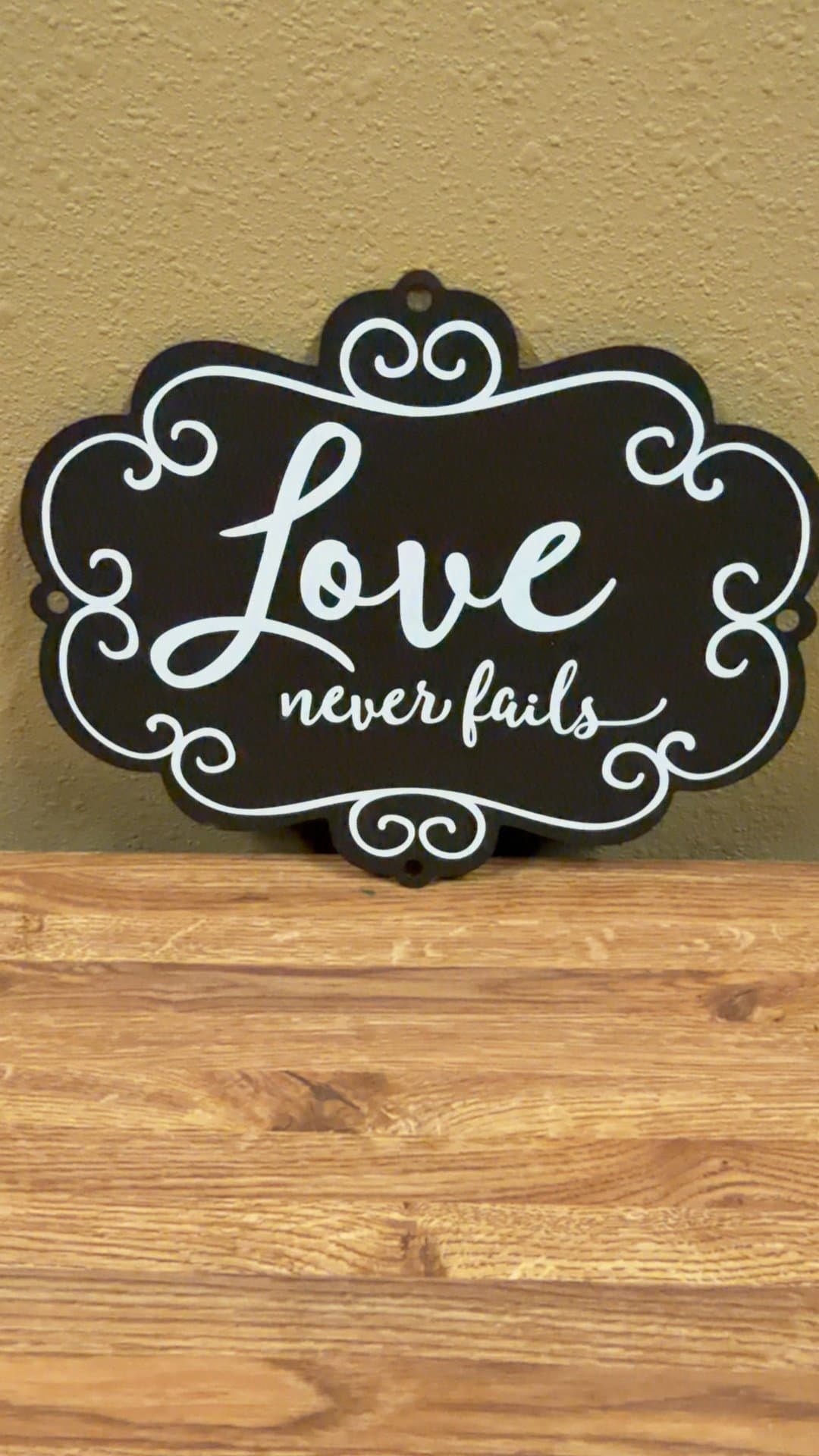 Love Never Fails Decorative Wall Sign - Image 1