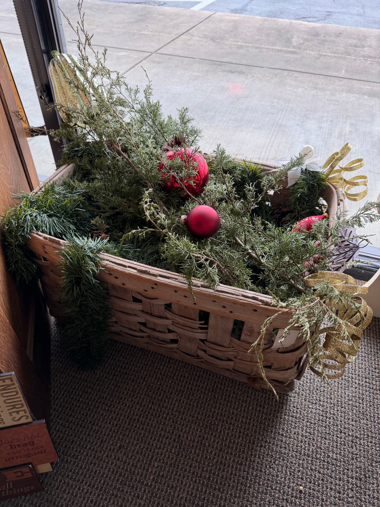 Decorative Basket with Holiday Greenery and Ornaments